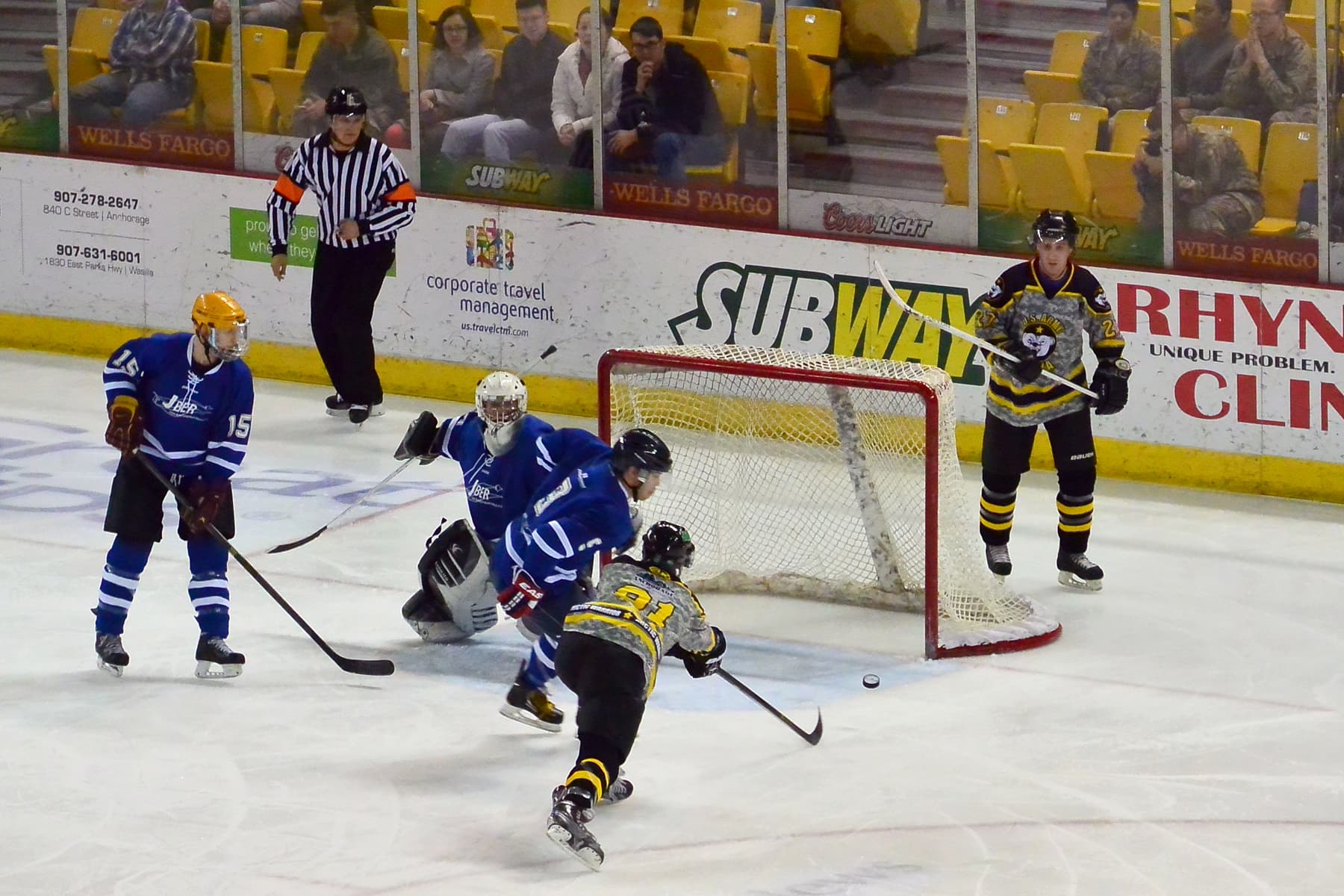 Ice hockey game action near the net